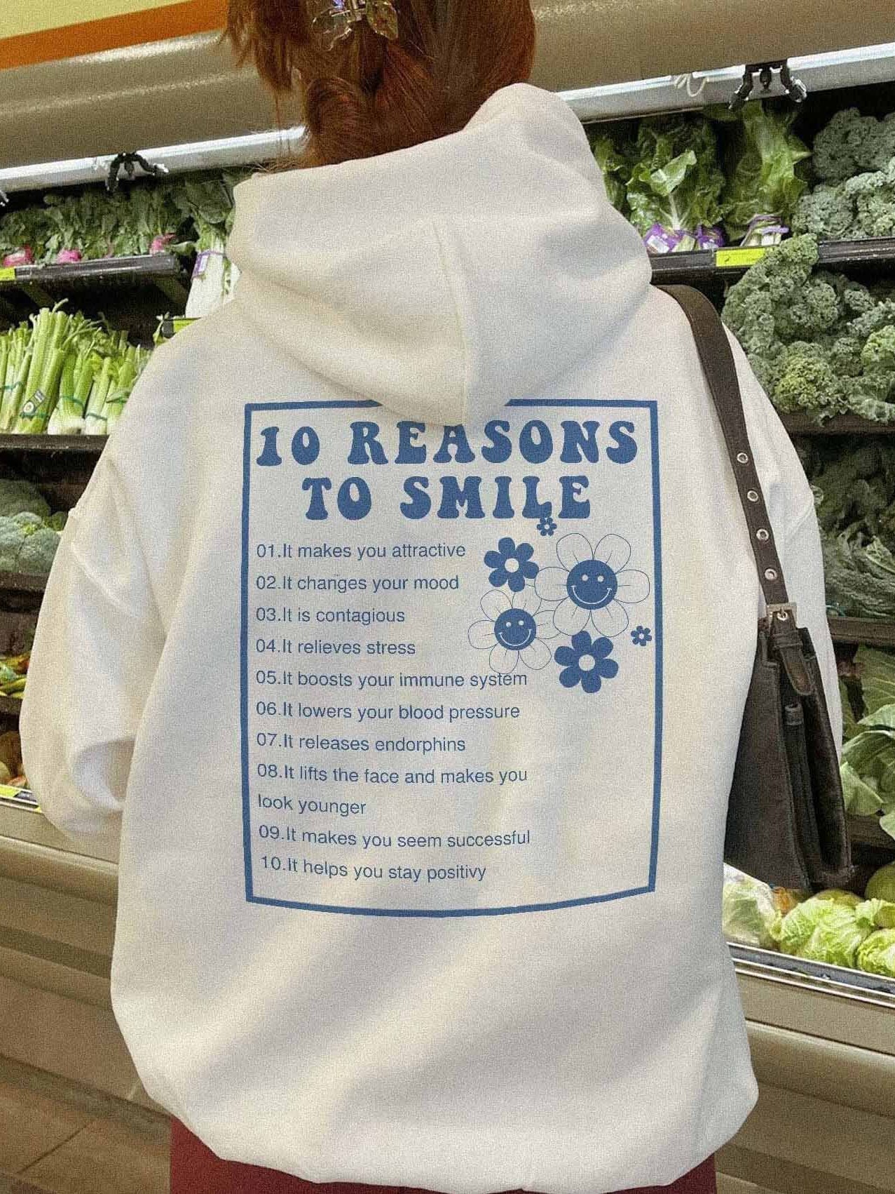 Sweat à capuche imprimé fleurs 10 raisons de sourire