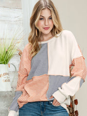 Sudadera de punto con cuello redondo y costuras expuestas en bloques de color