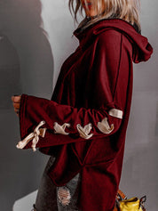 Exposed Seam Loose Neck Hooded Lace Up Bell Sleeve Pullover