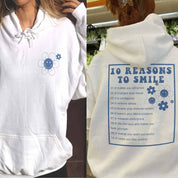 Sweat à capuche imprimé fleurs 10 raisons de sourire