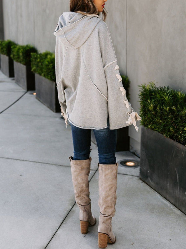 Exposed Seam Loose Neck Hooded Lace Up Bell Sleeve Pullover
