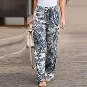 FLORA | Elegant pants with floral print for women