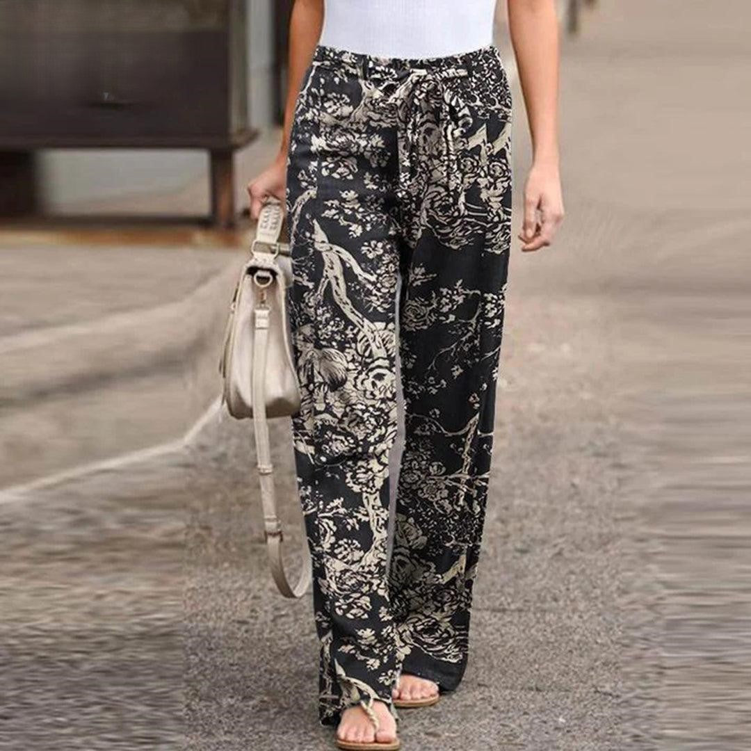 FLORA | Elegant pants with floral print for women